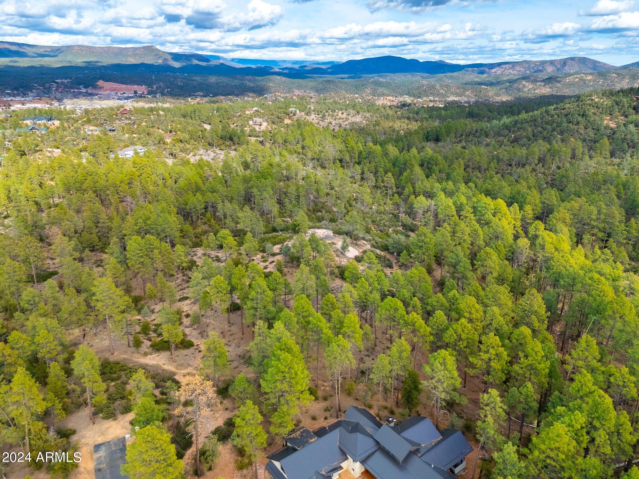3109 East Game Trail, Unit 250 Payson, AZ 85541 - Photo 14 of 18 a view of a yard with an outdoor space