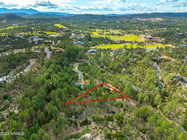 a view of a city with an ocean