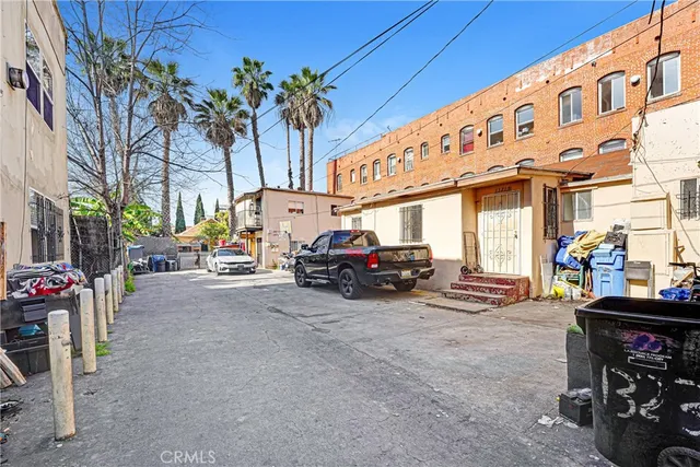 a view of a street with cars