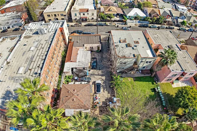 an aerial view of a house with a garden
