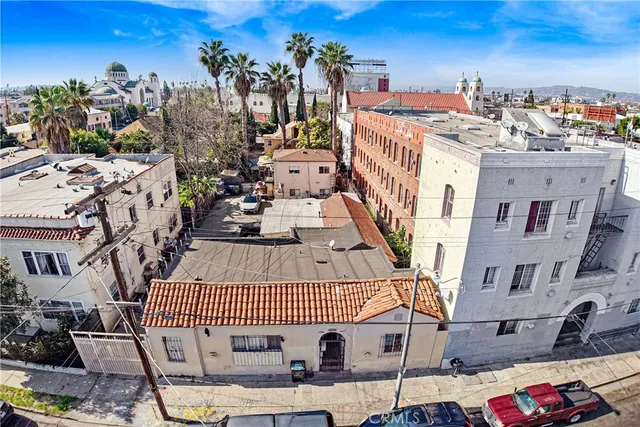 a view of roof deck with patio