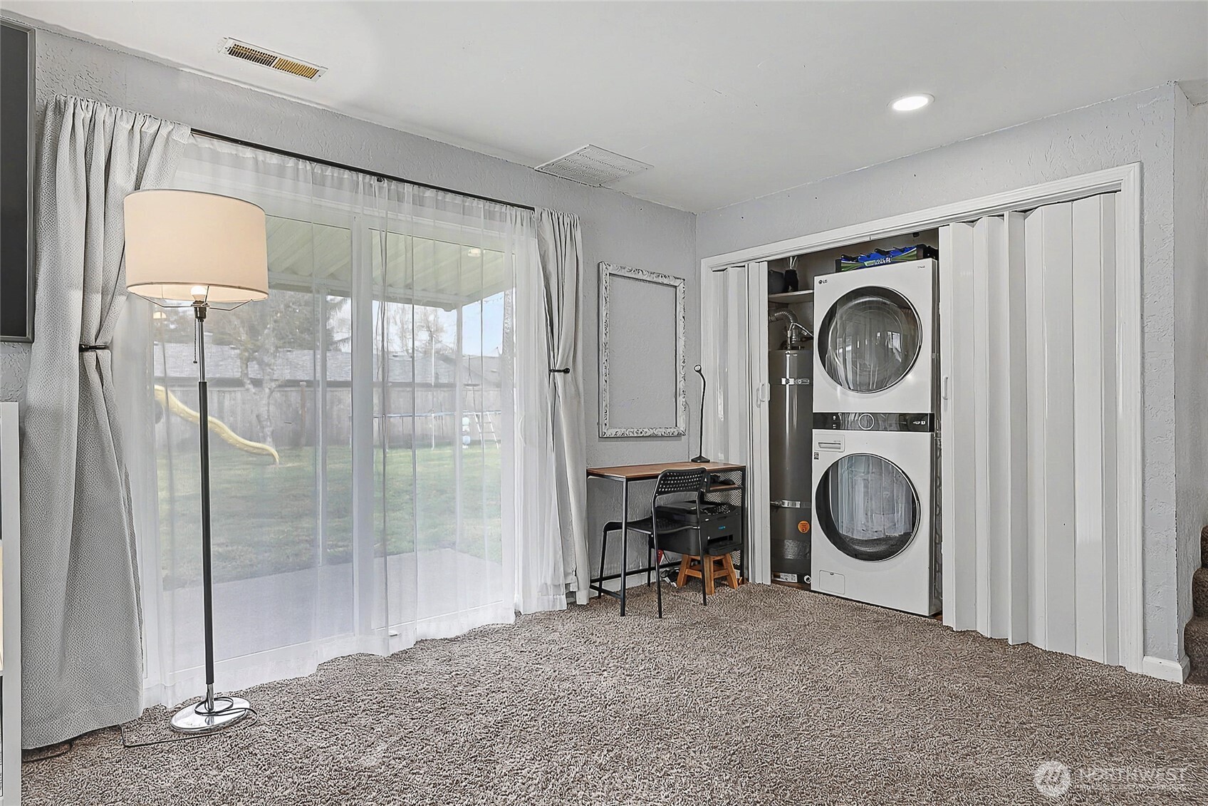 6003 Armour Loop Southeast Olympia, WA 98513 - Photo 14 of 25 a view of a storage & utility room with washer and dryer