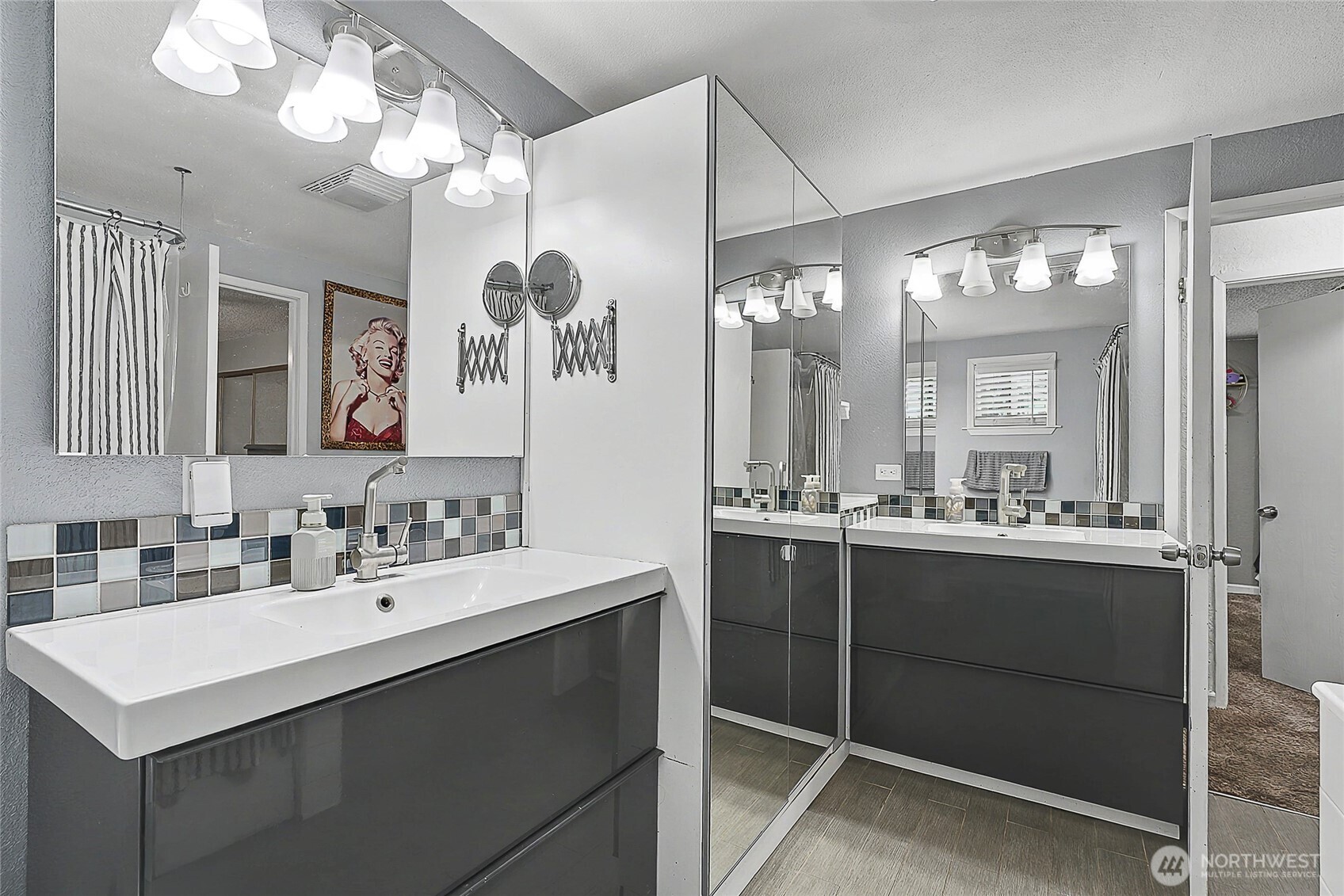 6003 Armour Loop Southeast Olympia, WA 98513 - Photo 17 of 25 a bathroom with a sink vanity and a mirror