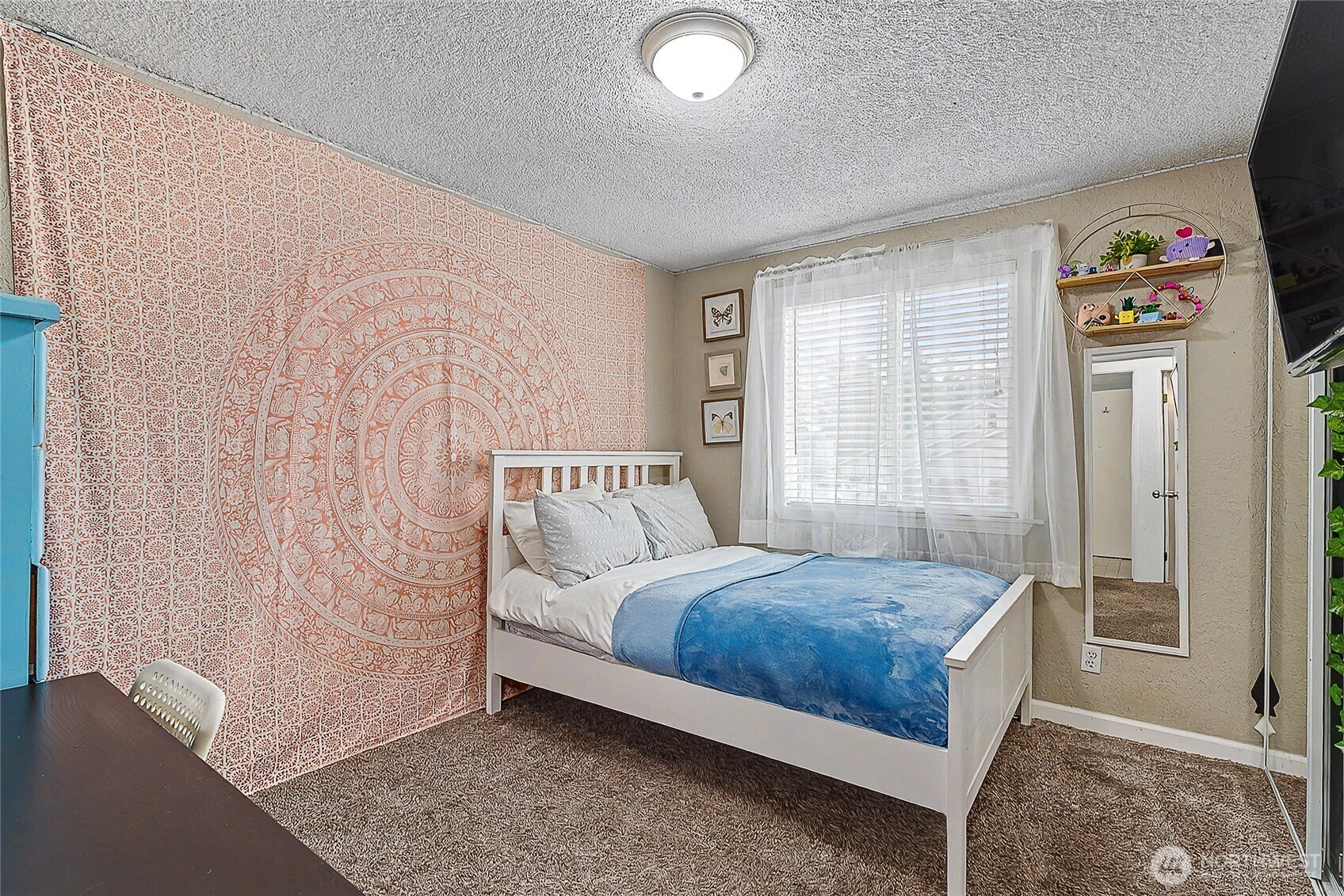 6003 Armour Loop Southeast Olympia, WA 98513 - Photo 19 of 25 a bedroom with a bed and a window with outer view