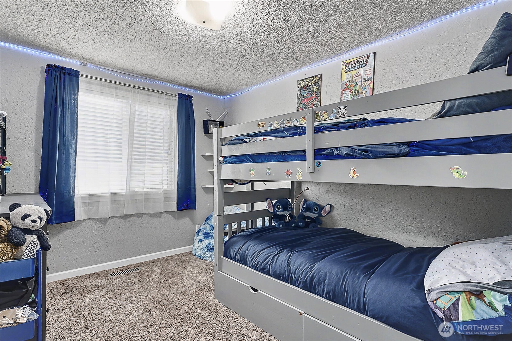 6003 Armour Loop Southeast Olympia, WA 98513 - Photo 20 of 25 a living room with a bed and a window