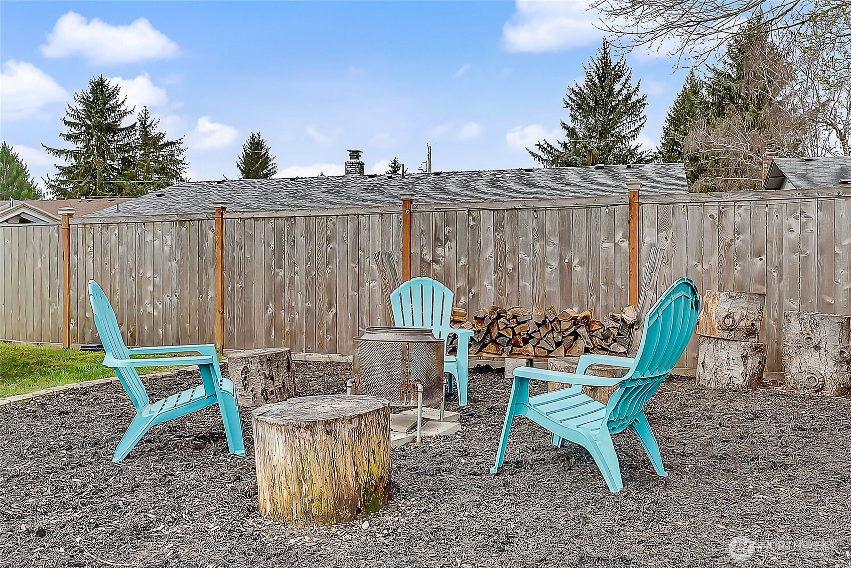 6003 Armour Loop Southeast Olympia, WA 98513 - Photo 24 of 25 a view of a chair and table in backyard