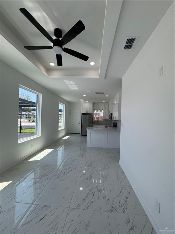 2101 Selena Street, Unit 1 Mission, TX 78572 - Photo 3 of 18 a view of a livingroom with a kitchen