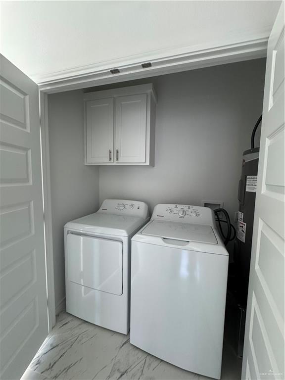 2101 Selena Street, Unit 1 Mission, TX 78572 - Photo 9 of 18 a utility room with dryer and washer