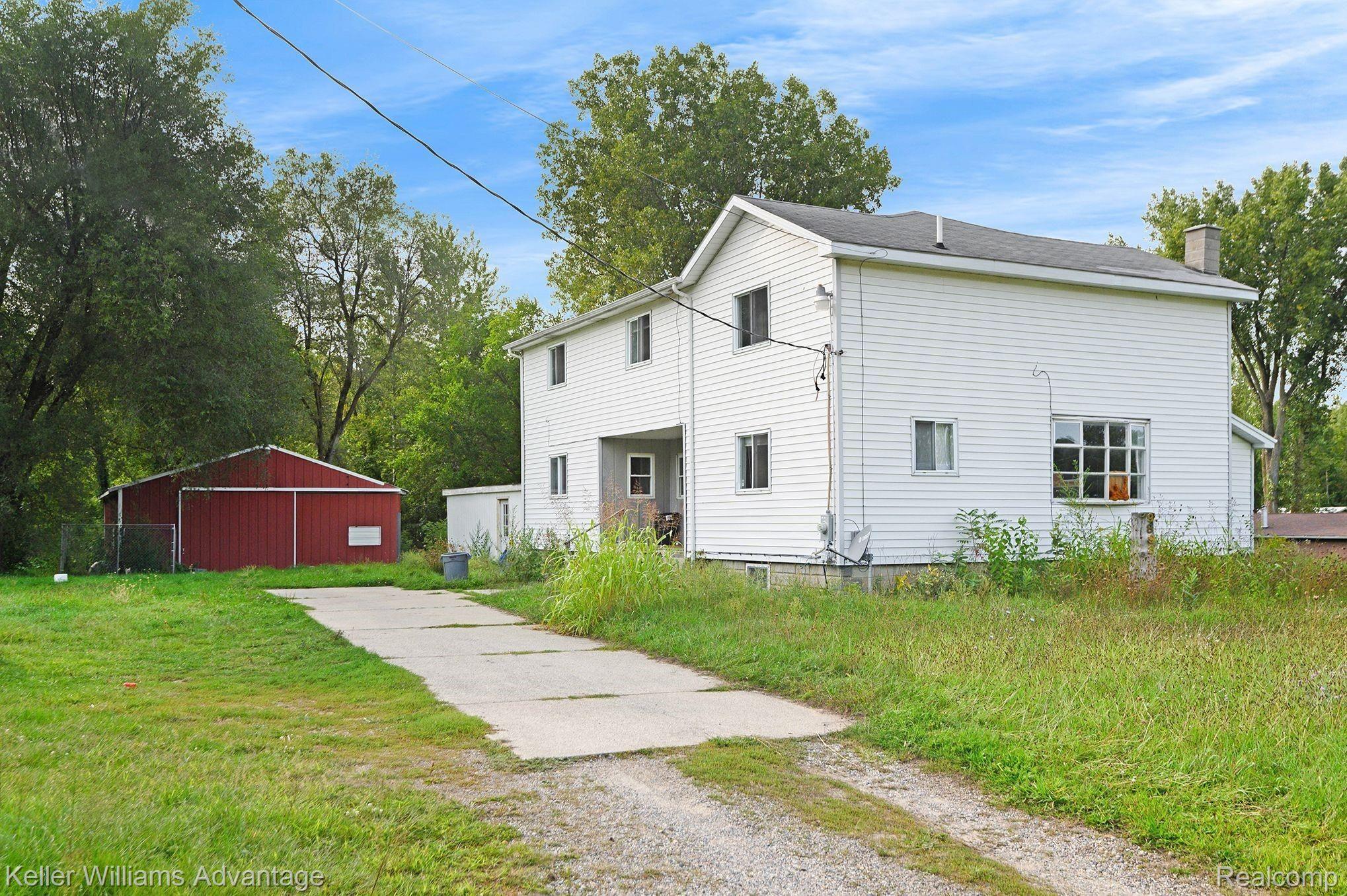 9898 South Lewis Road Millington, MI 48746 - Photo 1 of 20 Front of House.jpeg