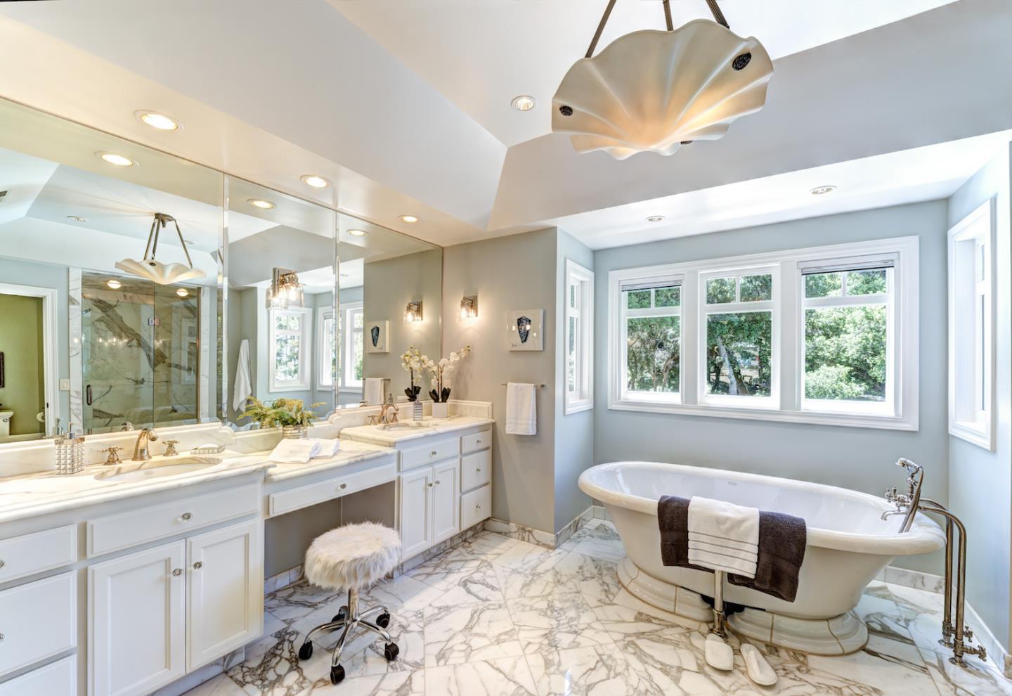 17915 Foster Road Los Gatos, CA 95030 - Photo 14 of 30 a bathroom with a granite countertop sink mirror and a bathtub
