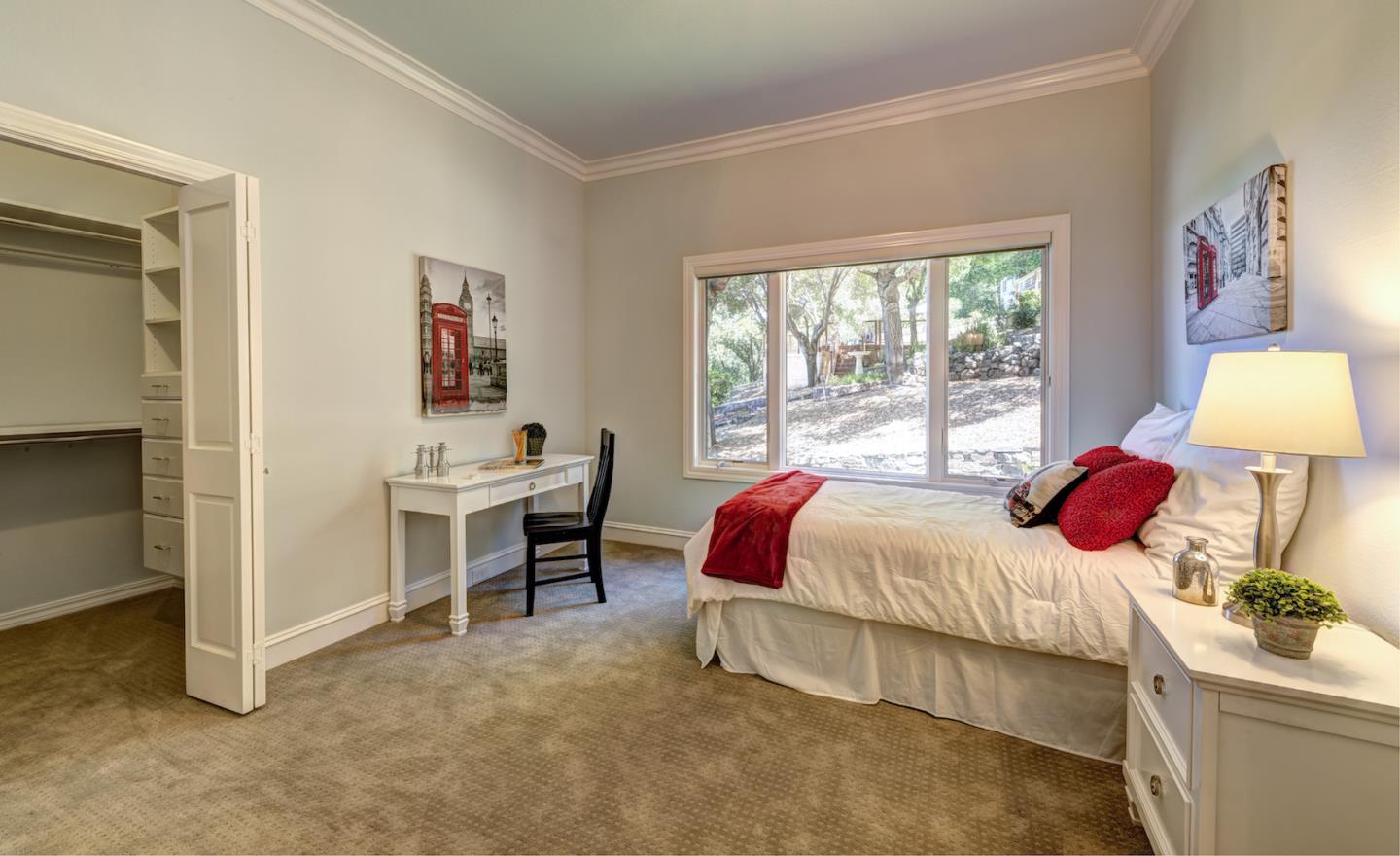 17915 Foster Road Los Gatos, CA 95030 - Photo 16 of 30 a bed room with a bed and a chair