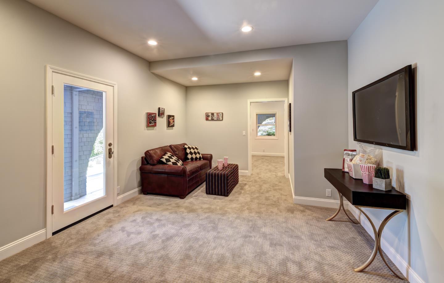 17915 Foster Road Los Gatos, CA 95030 - Photo 18 of 30 a living room with furniture and a flat screen tv