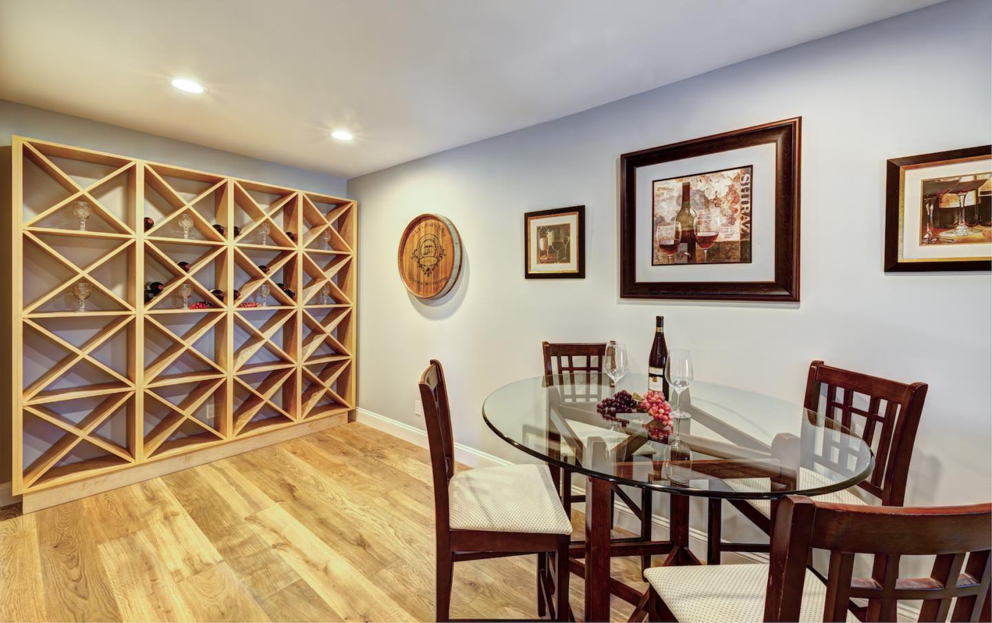 17915 Foster Road Los Gatos, CA 95030 - Photo 20 of 30 a view of a dining room with furniture and wall paintings