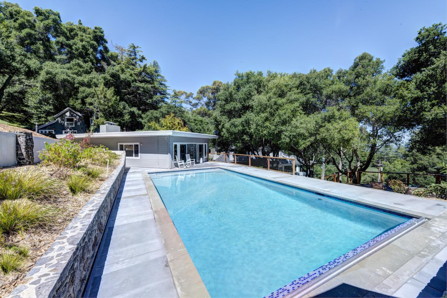 17915 Foster Road Los Gatos, CA 95030 - Photo 23 of 30 a view of a swimming pool with a patio