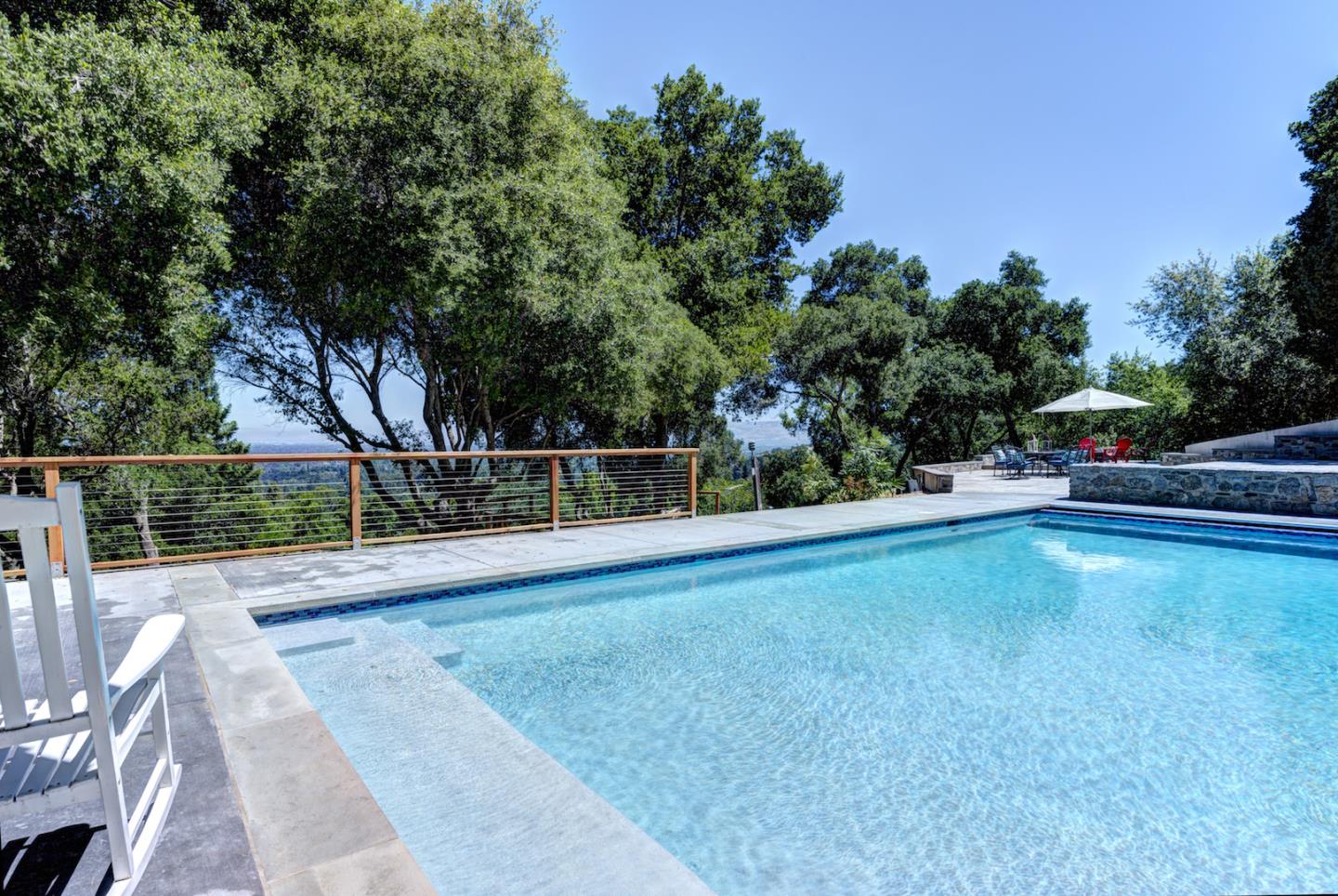 17915 Foster Road Los Gatos, CA 95030 - Photo 25 of 30 a view of a swimming pool with an outdoor seating