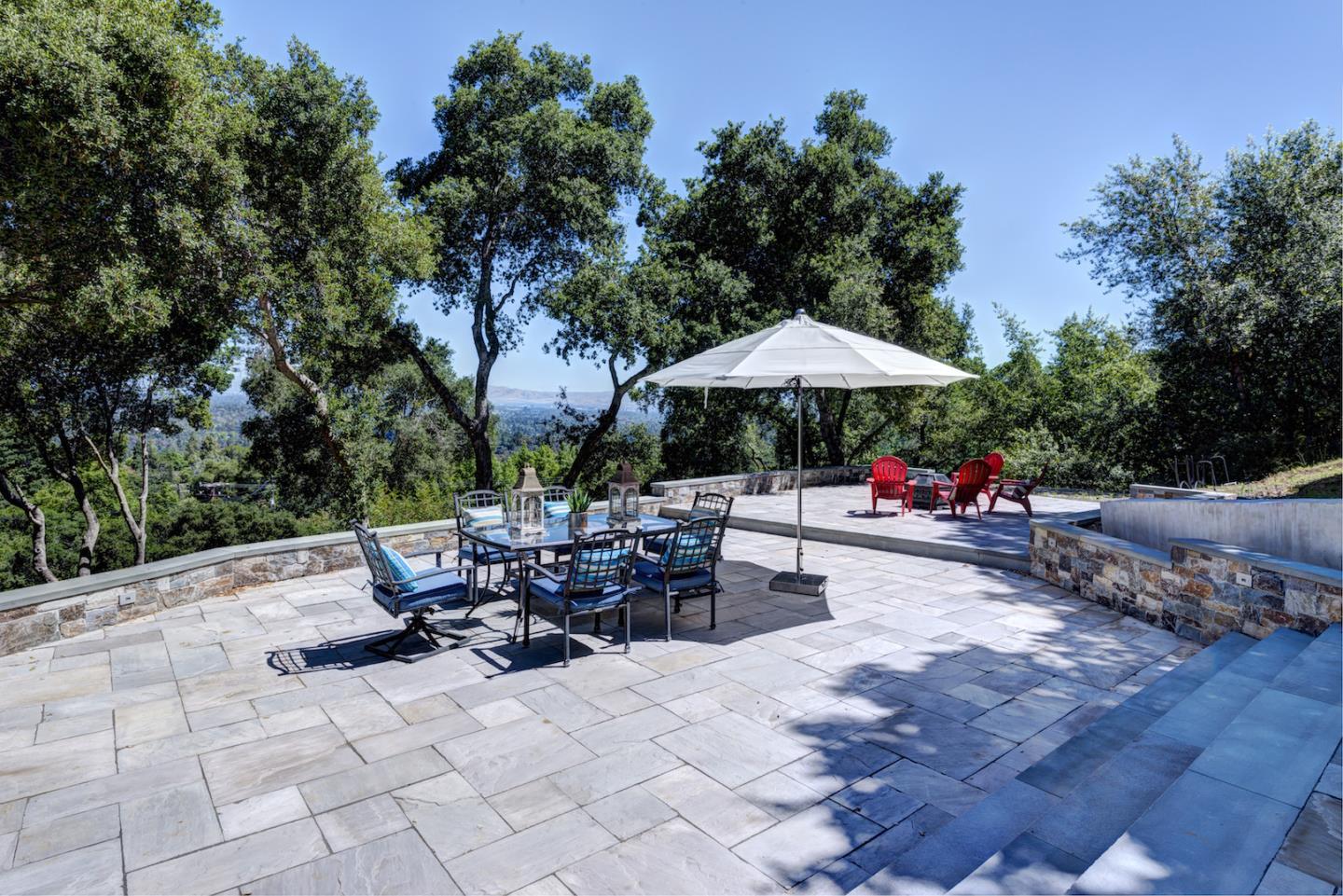 17915 Foster Road Los Gatos, CA 95030 - Photo 26 of 30 a view of backyard with plants and outdoor seating