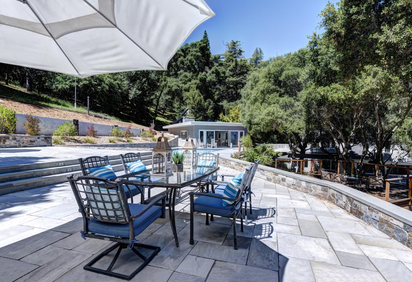 17915 Foster Road Los Gatos, CA 95030 - Photo 27 of 30 a patio with glass top table and chairs