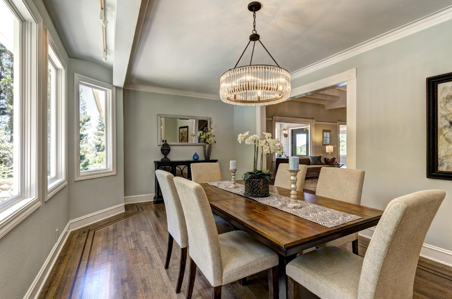 17915 Foster Road Los Gatos, CA 95030 - Photo 8 of 30 a view of a dining room with furniture wooden floor and chandelier