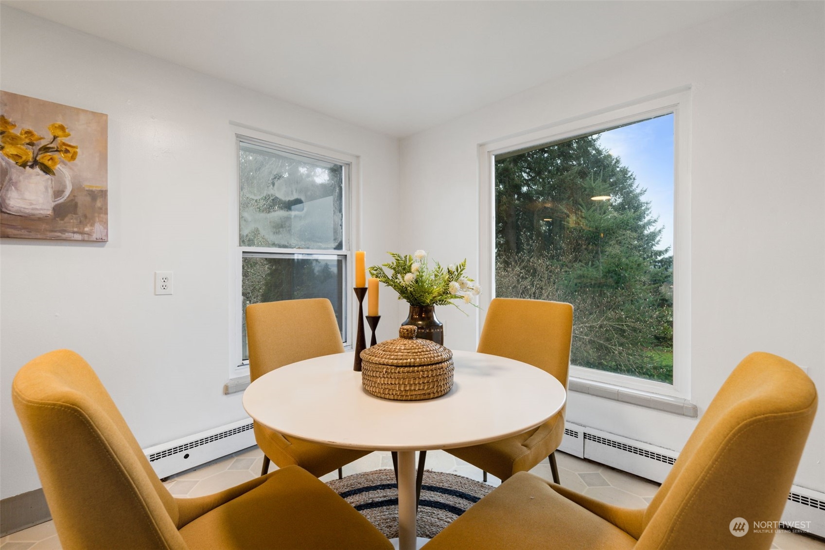 913 Powell Street Steilacoom, WA 98388 - Photo 12 of 40 a view of a dining room with furniture window and wooden floor