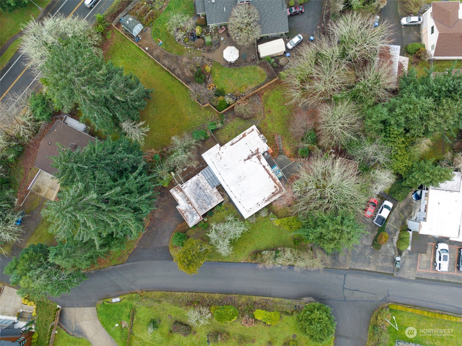 913 Powell Street Steilacoom, WA 98388 - Photo 38 of 40 an aerial view of residential house with outdoor space and swimming pool