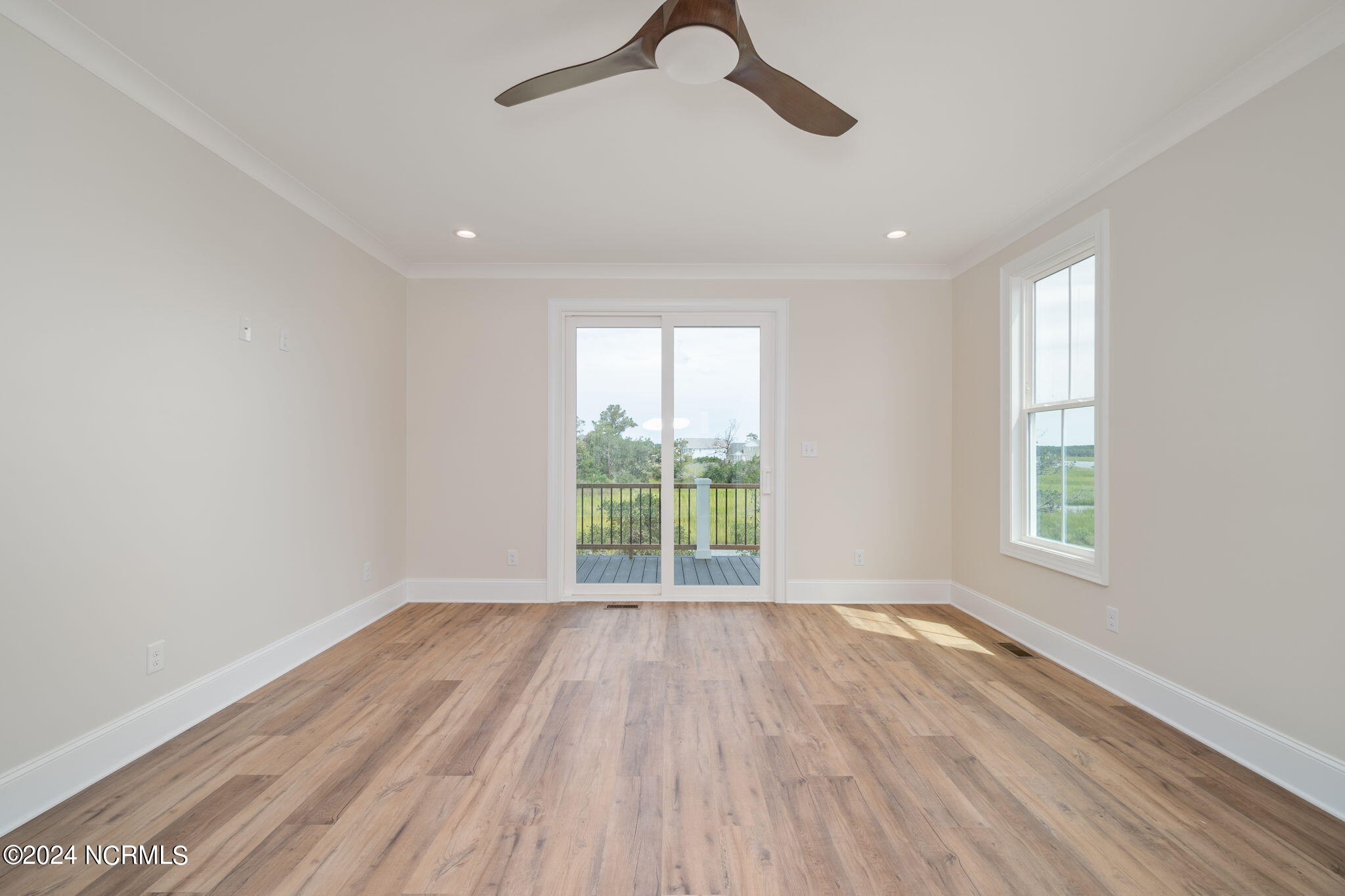 1500 Olde Farm Road Morehead City, NC 28557 - Photo 17 of 47 Primary bedroom suite w/ water views