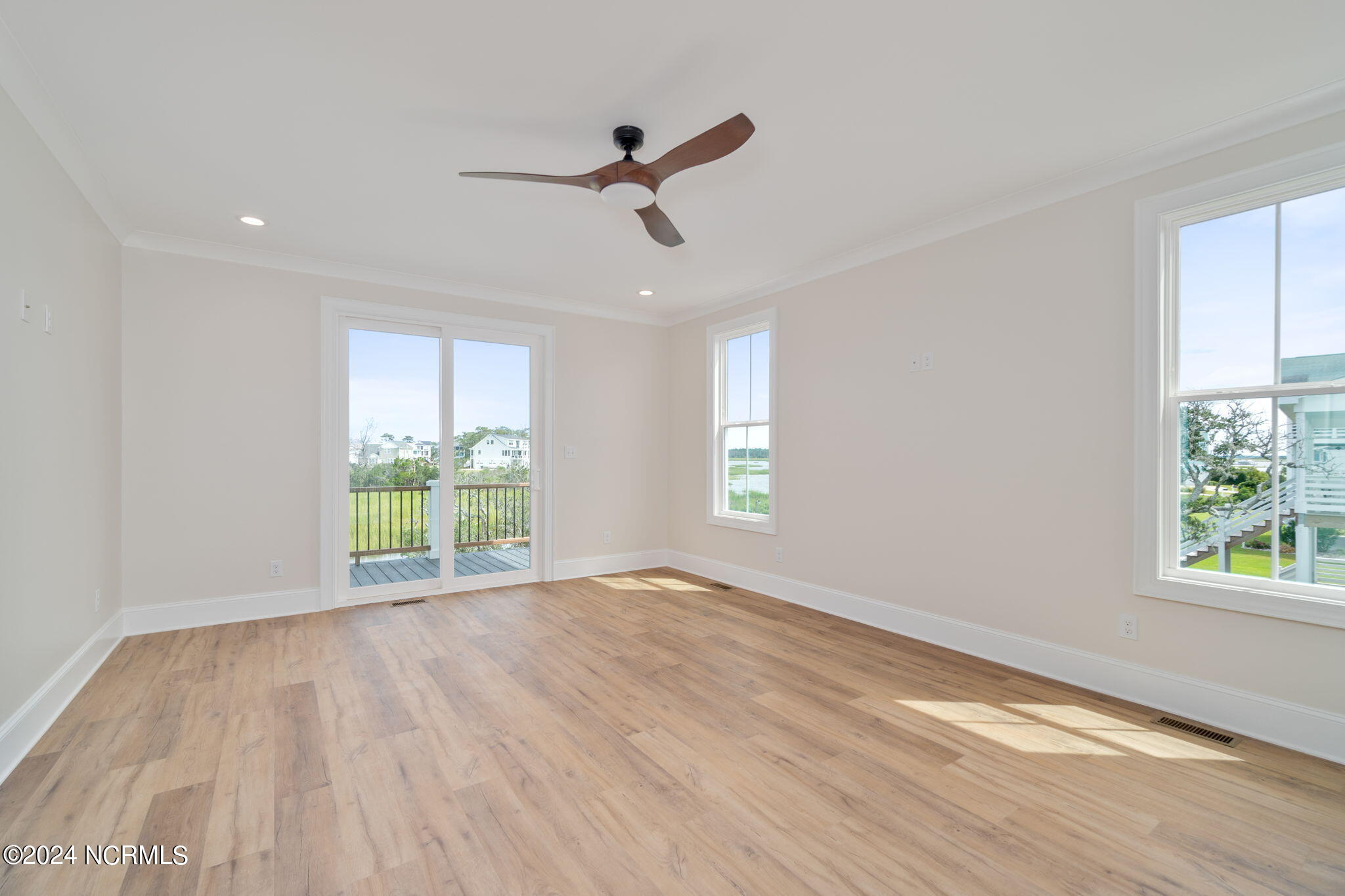 1500 Olde Farm Road Morehead City, NC 28557 - Photo 6 of 47 Primary bedroom suite w/ water views