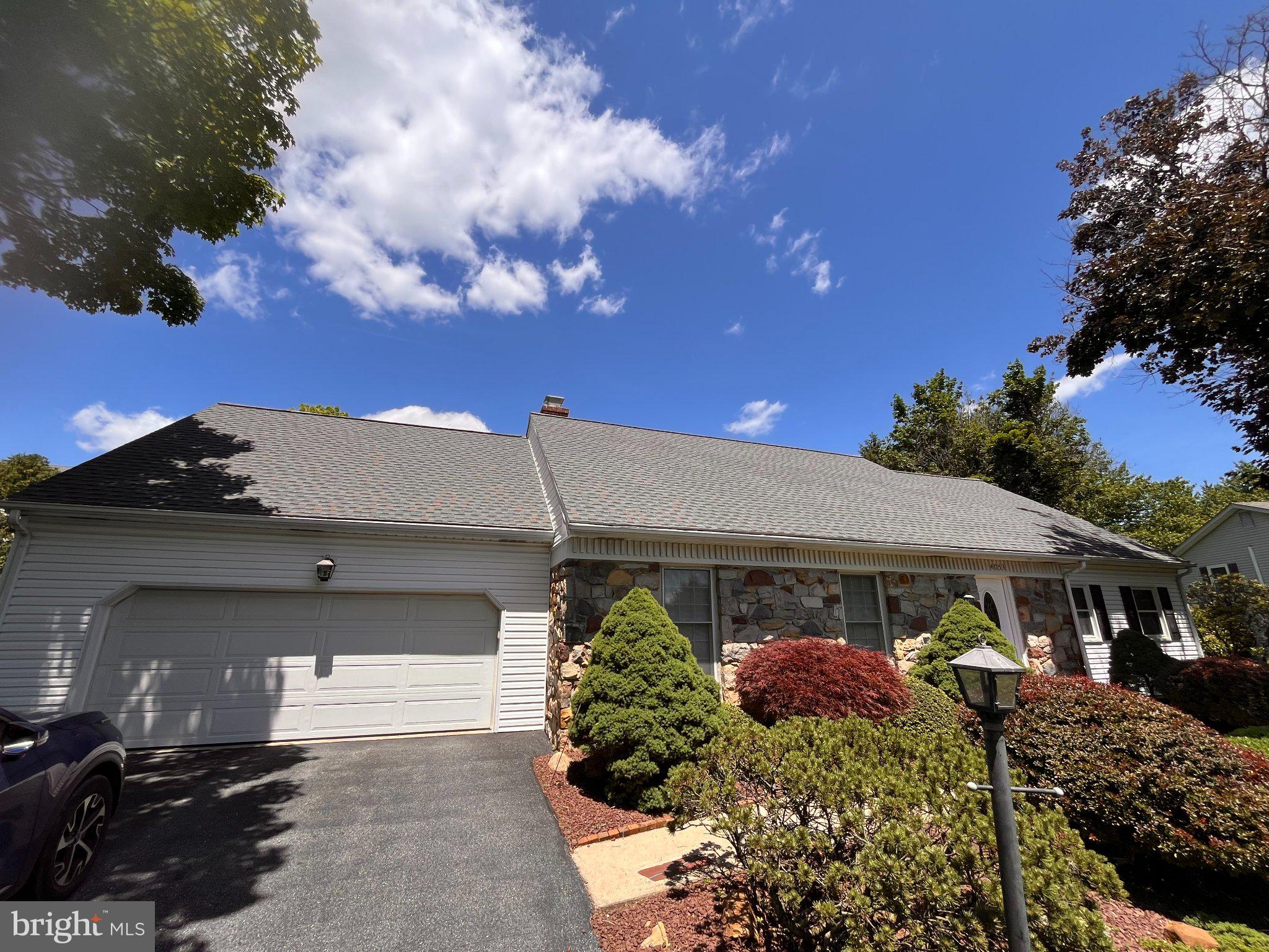 4053 Wedgewood Road Allentown, PA 18104 - Photo 5 of 8 Charming home under a bright sky.