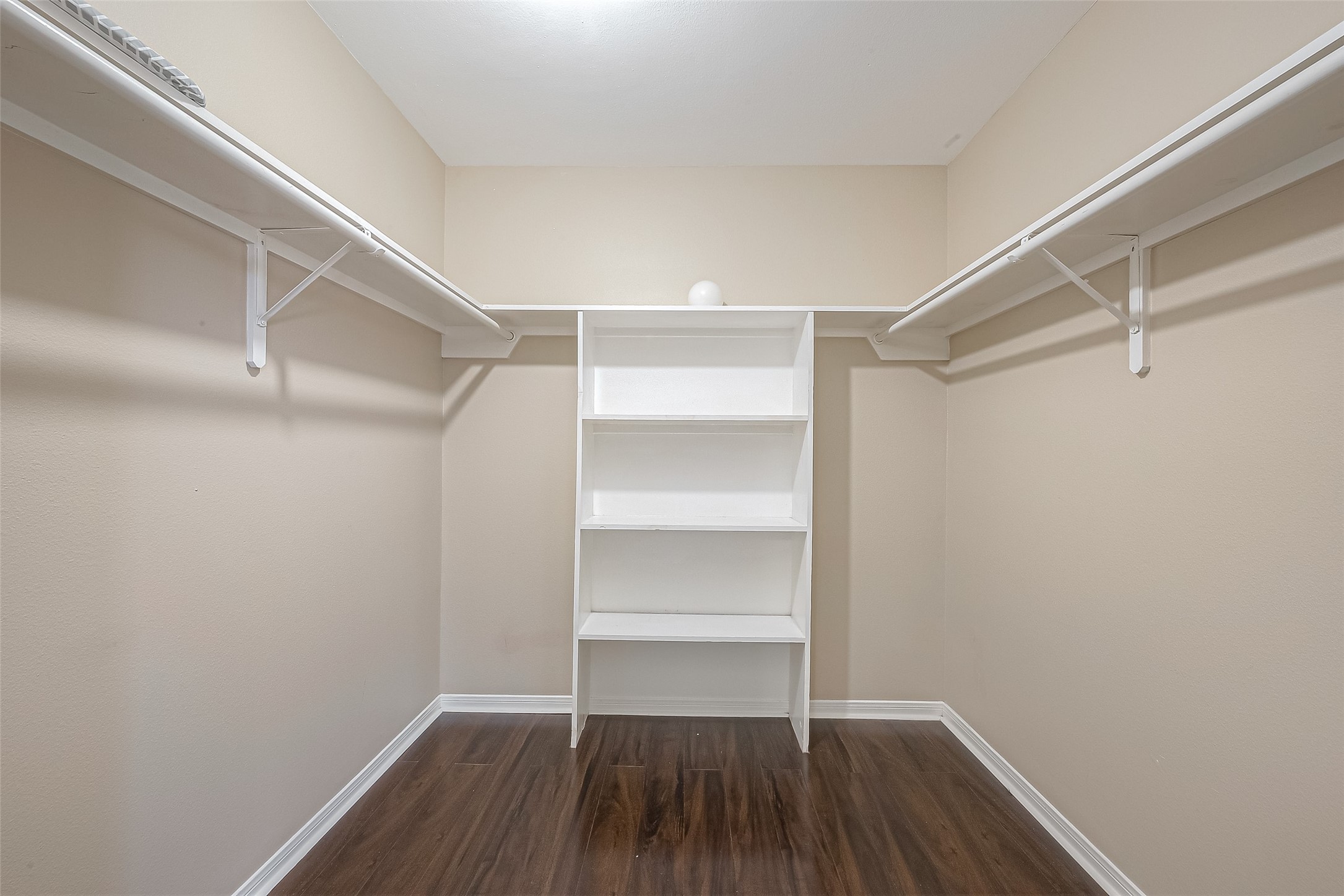 3758 Tanglewilde Street, Unit 2 Houston, TX 77063 - Photo 20 of 23 a view of walk in closet with empty racks