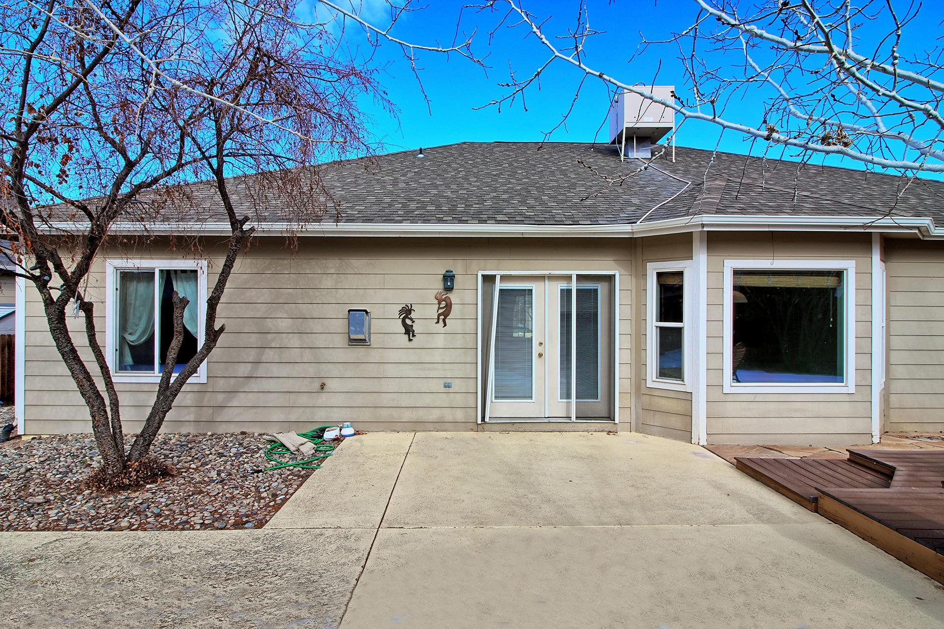 a house view with a outdoor space