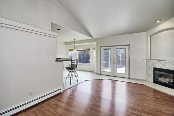 a view of livingroom with furniture and a fireplace
