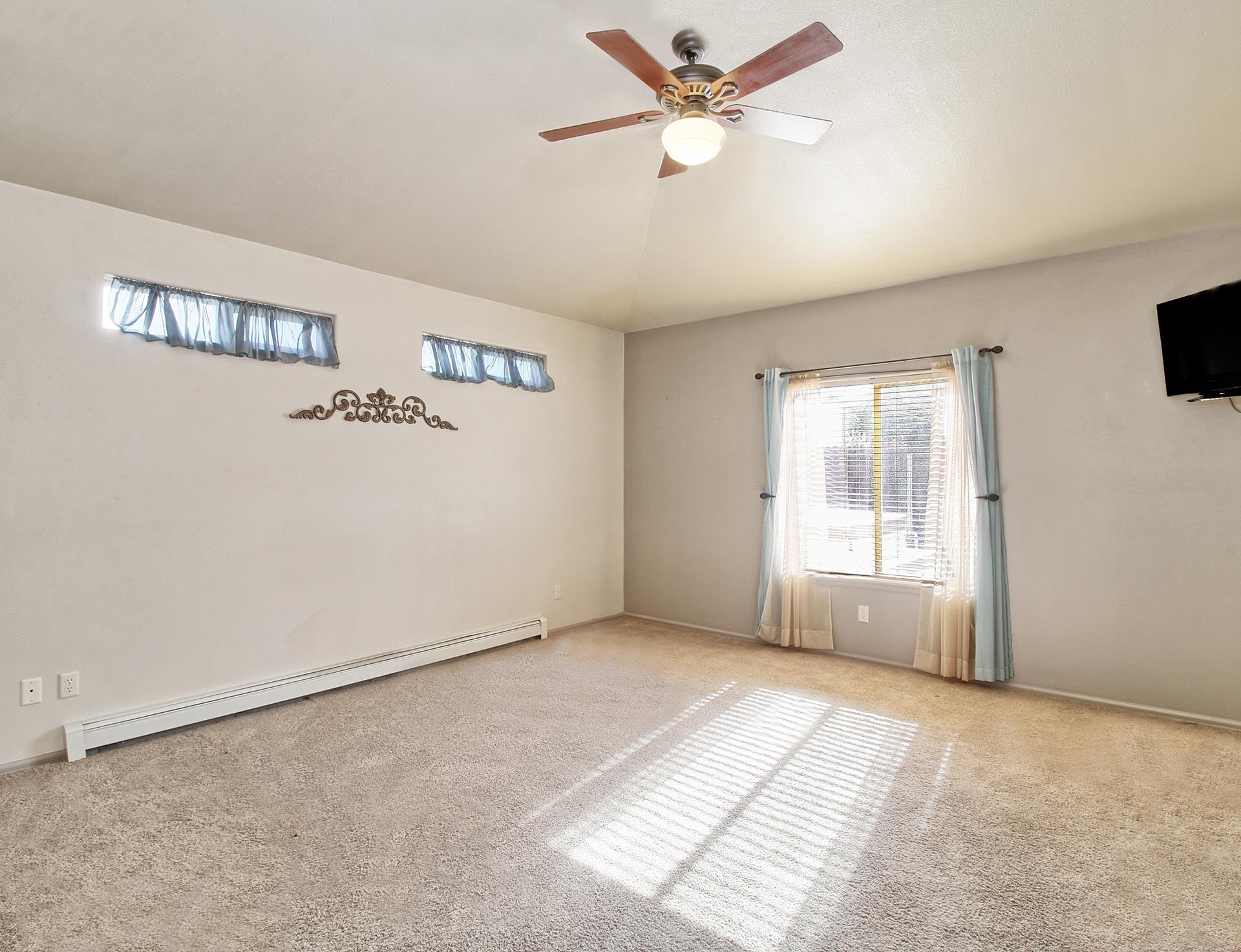 2211 Victorian Court Grand Junction, CO 81507 - Photo 38 of 42 wooden floor in an empty room with a window