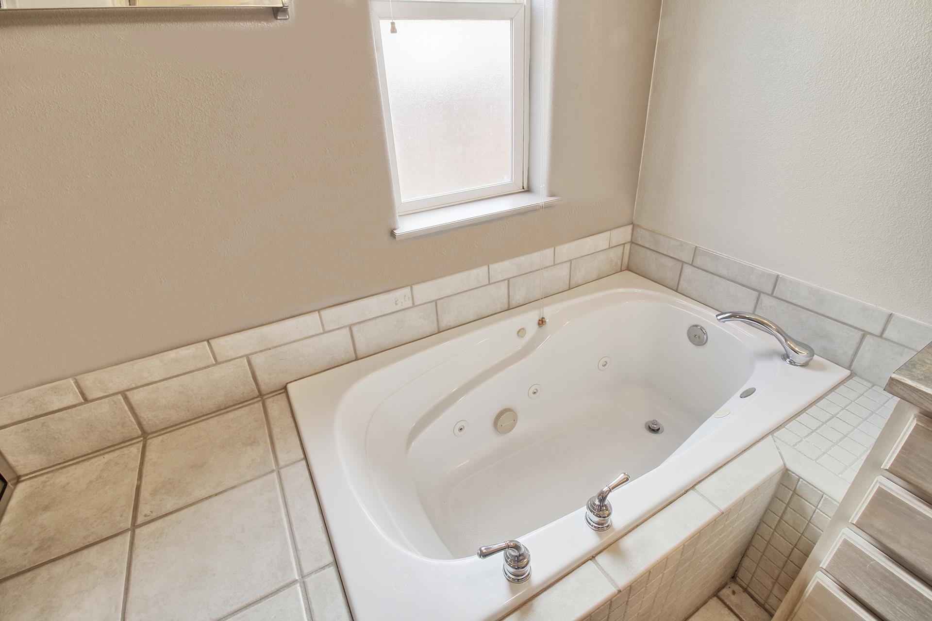2211 Victorian Court Grand Junction, CO 81507 - Photo 42 of 42 a bathroom with a bathtub