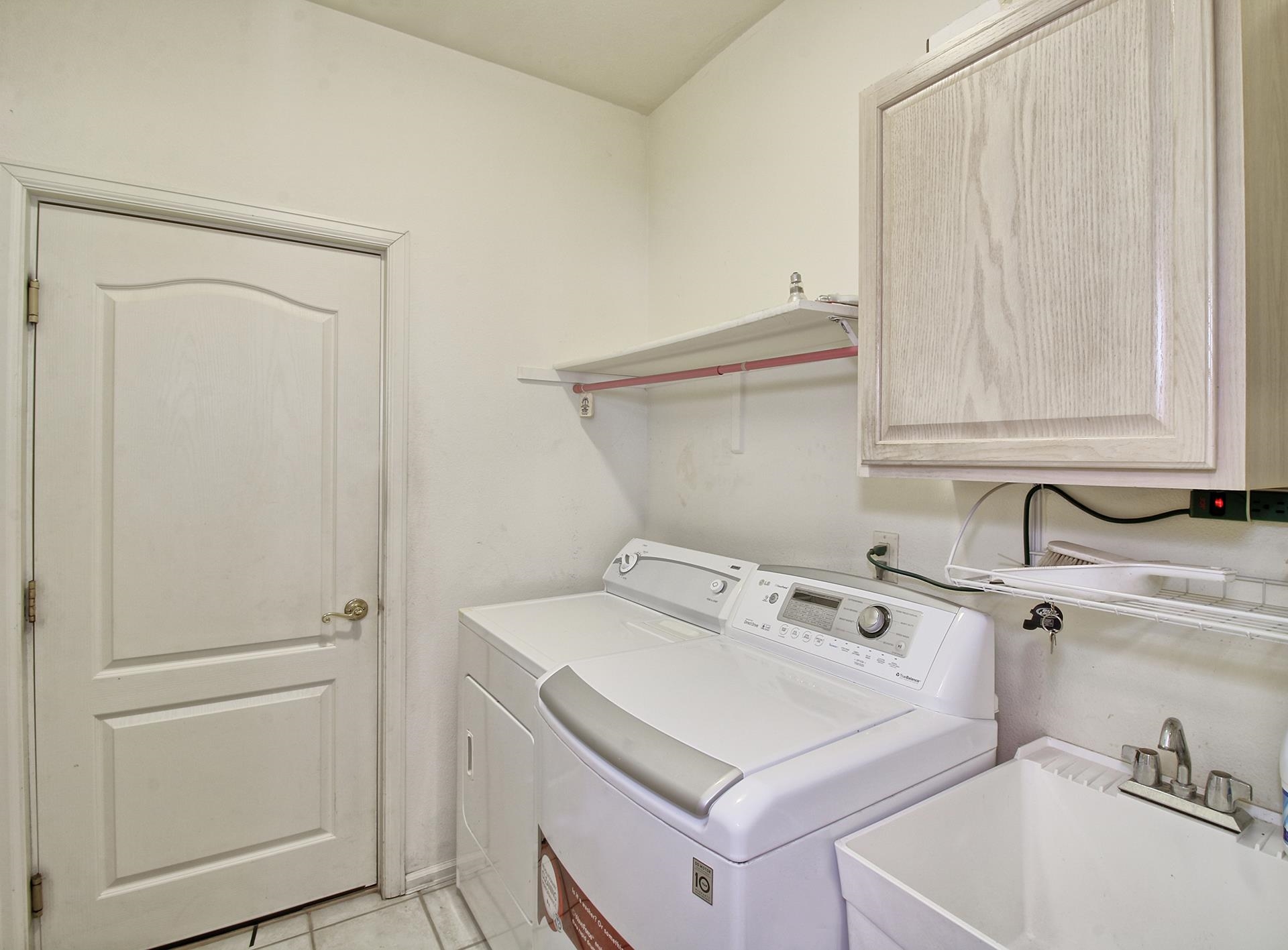 2211 Victorian Court Grand Junction, CO 81507 - Photo 9 of 42 a utility room with dryer and washer