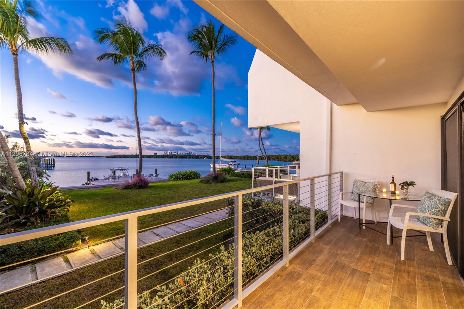 166 Harbor Drive, Unit 1A Key Biscayne, FL 33149 - Photo 26 of 86 a view of a balcony with chairs