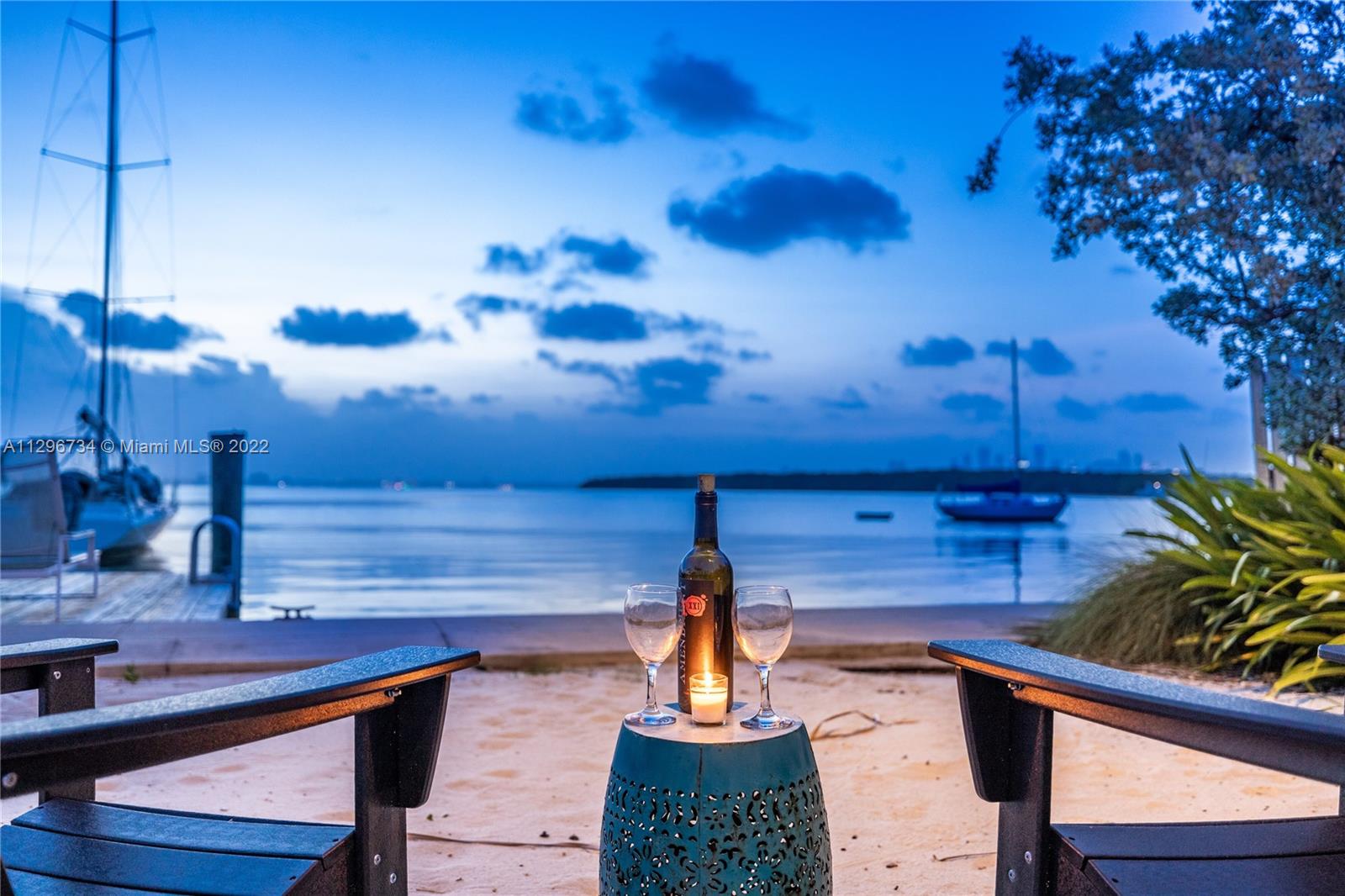 166 Harbor Drive, Unit 1A Key Biscayne, FL 33149 - Photo 53 of 86 a view of a terrace with chairs
