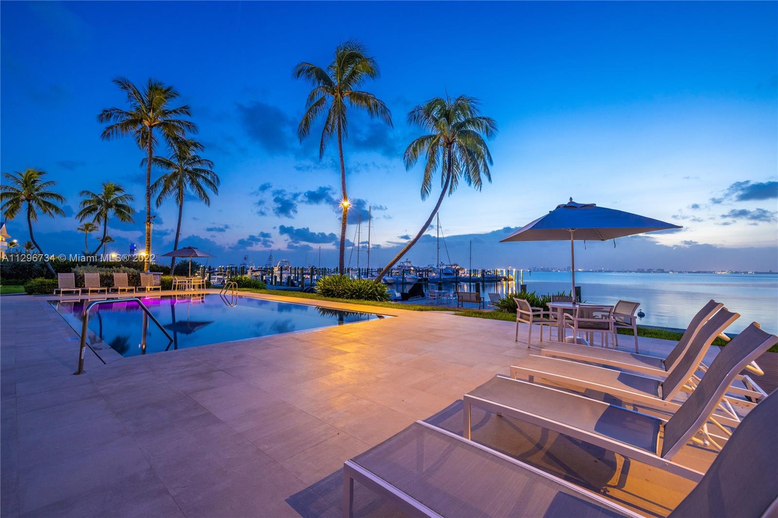 166 Harbor Drive, Unit 1A Key Biscayne, FL 33149 - Photo 57 of 86 an outdoor space with patio and swimming pool