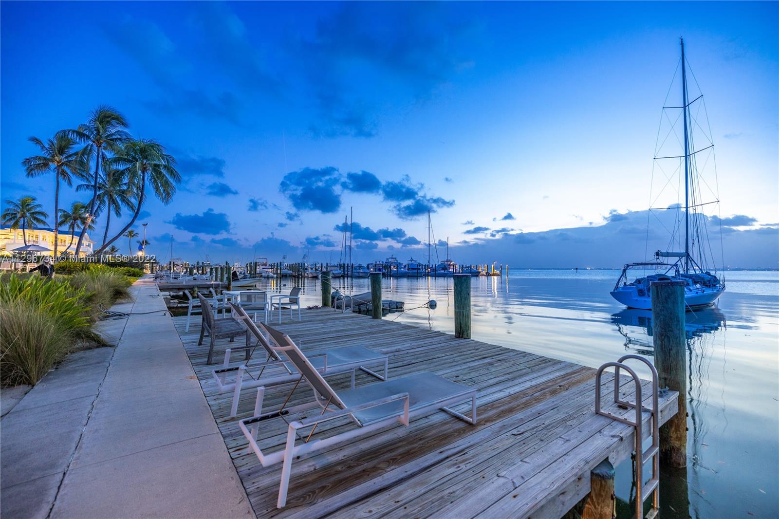 166 Harbor Drive, Unit 1A Key Biscayne, FL 33149 - Photo 75 of 86 a view of a balcony with chairs