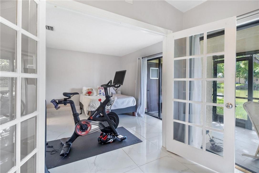 727 Banks Road, Unit 98 Margate, FL 33063 - Photo 16 of 22 a view of a room with gym equipment