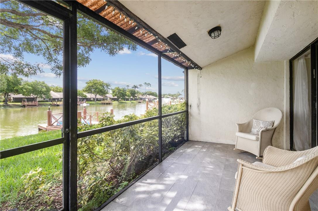 727 Banks Road, Unit 98 Margate, FL 33063 - Photo 21 of 22 a view of an outdoor space with a balcony