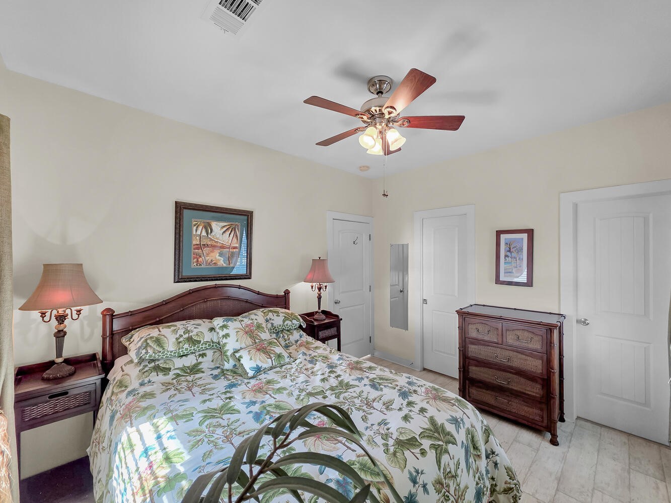 2577 Holiday Crystal Beach, TX 77650 - Photo 12 of 36 a bedroom with a bed and a chandelier