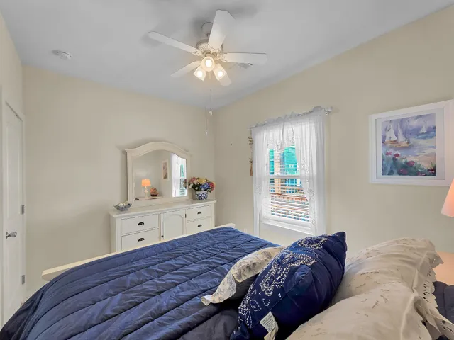 a front view of a building with retail shops