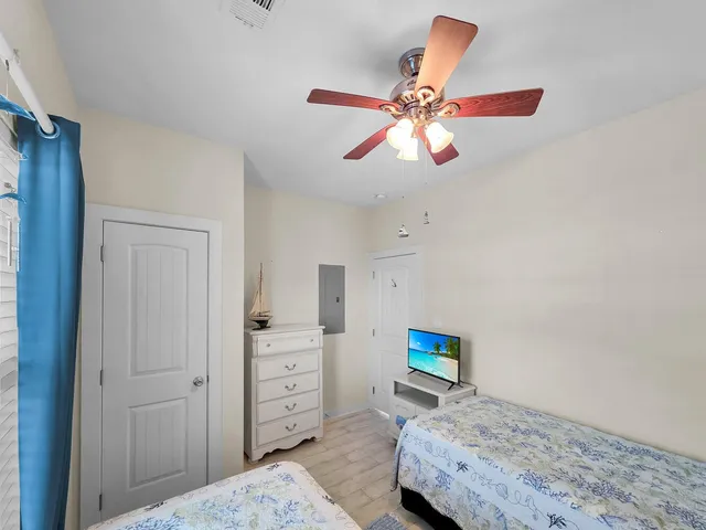 an aerial view of a house with a yard basket ball court and outdoor seating