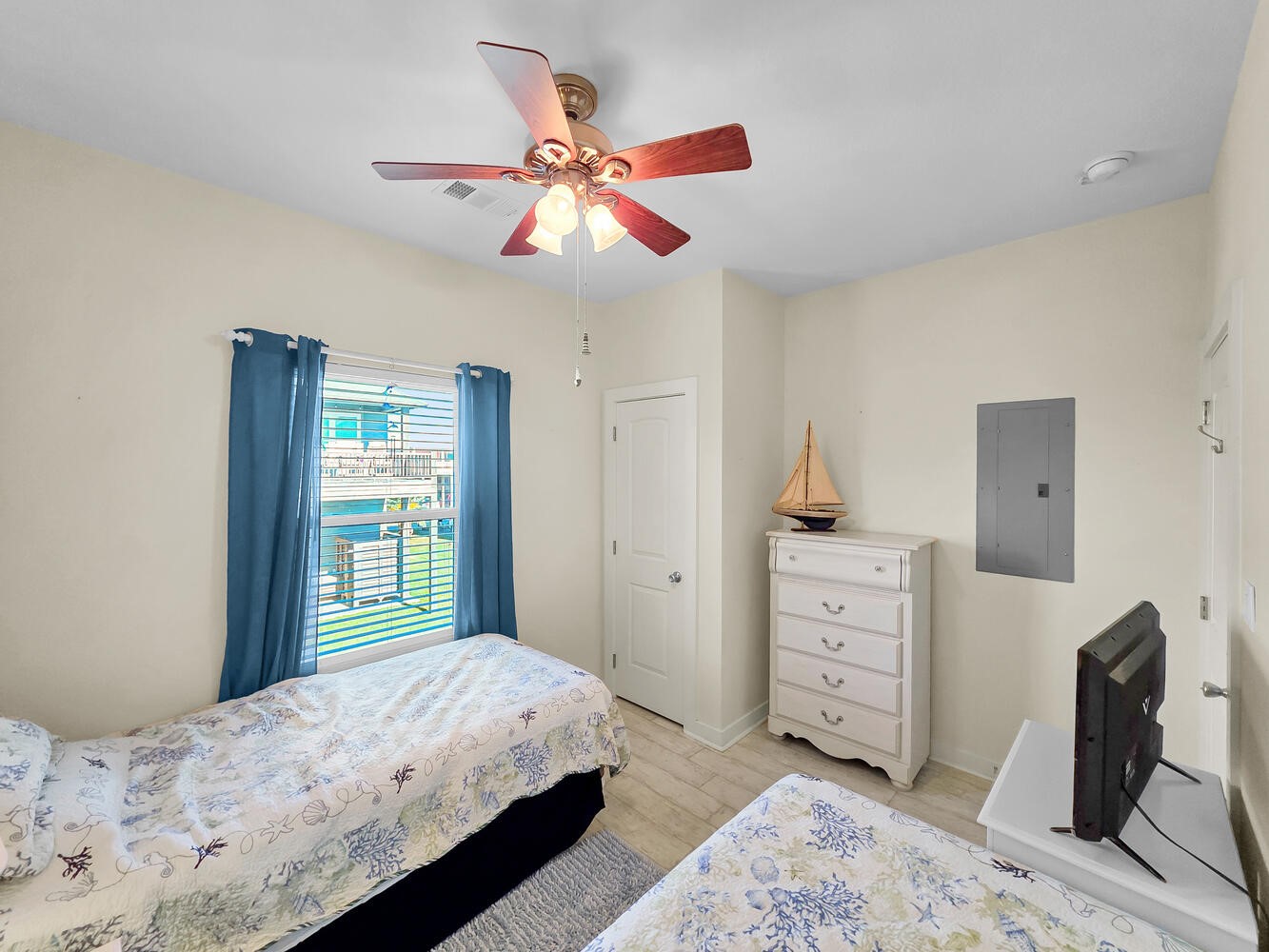 2577 Holiday Crystal Beach, TX 77650 - Photo 18 of 36 a bedroom with a bed and a dresser