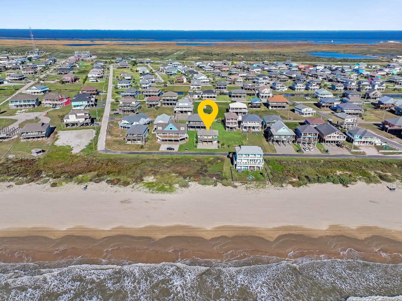 2577 Holiday Crystal Beach, TX 77650 - Photo 5 of 36 a view of a city with mountains in the background