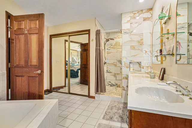 a bathroom with a sink and a mirror