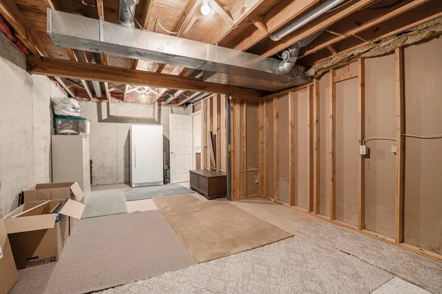 a living room with furniture pool and a fireplace