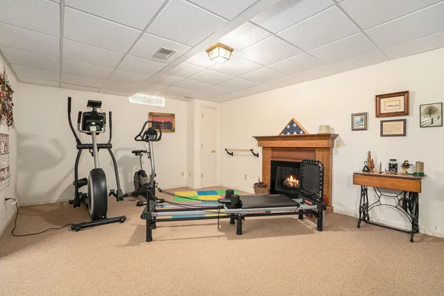 a room with furniture and a flat screen tv