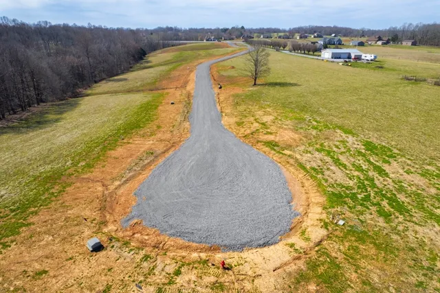 a view of a swimming pool with a lake