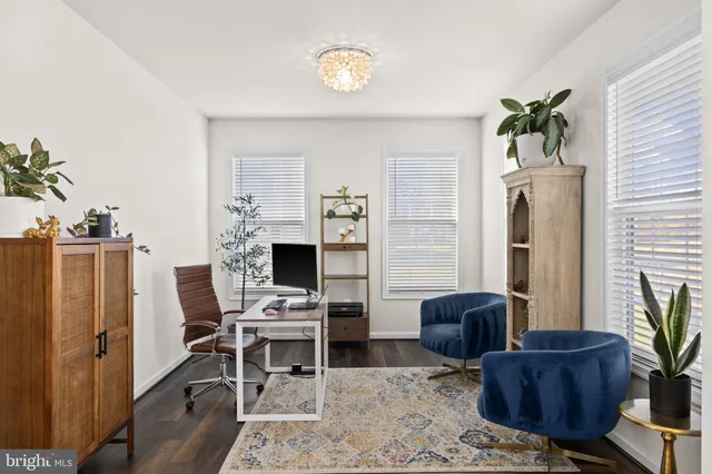 a kitchen with stainless steel appliances granite countertop a refrigerator stove microwave and sink