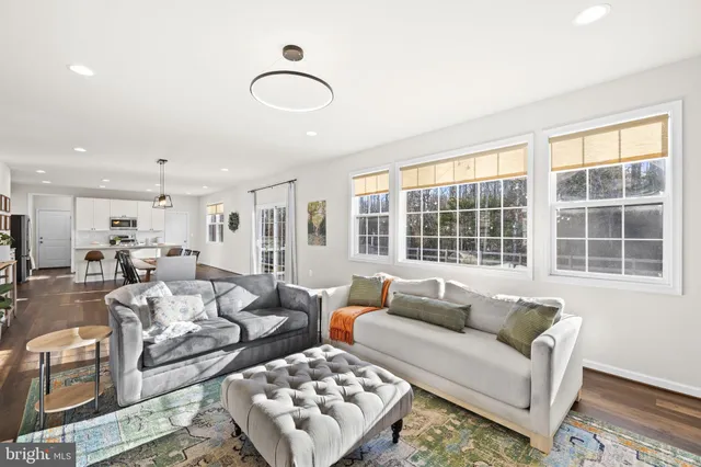 a bathroom with a double vanity sink a mirror and a shower